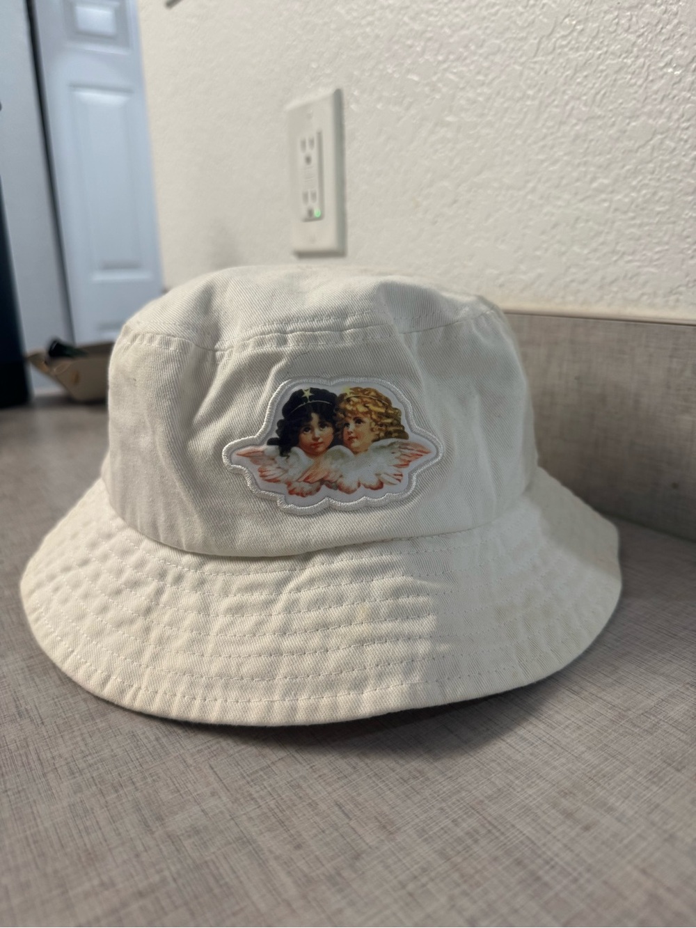 White Fiorucci Angel Patch Bucket Hat
